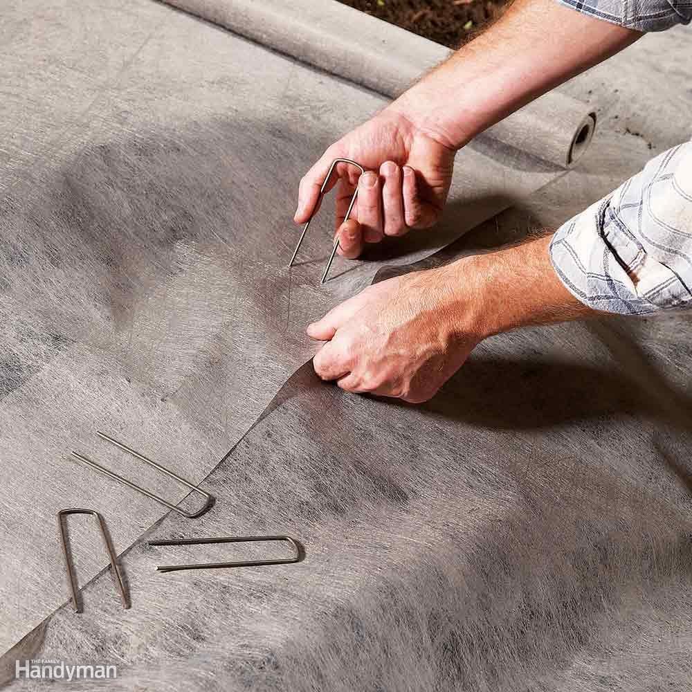 Use Landscape Fabric Staples to Anchor the Seams