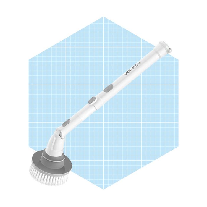 A cleaning brush with an adjustable handle and brush bristles is displayed against a light blue grid background.