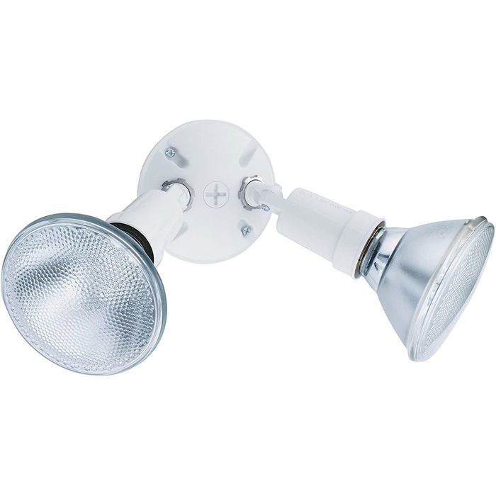 Two adjustable floodlight fixtures are mounted on a circular white base, designed to provide focused lighting in a surrounding environment, such as a room or outdoor area.