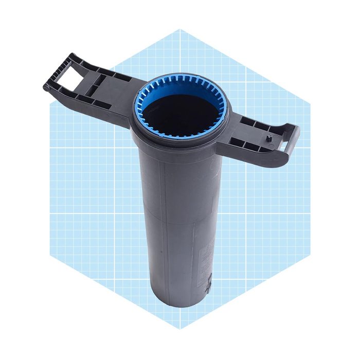 A cylindrical object with a blue inner ring and handles sits upright against a light blue grid background, suggesting a utility for lifting or holding items.
