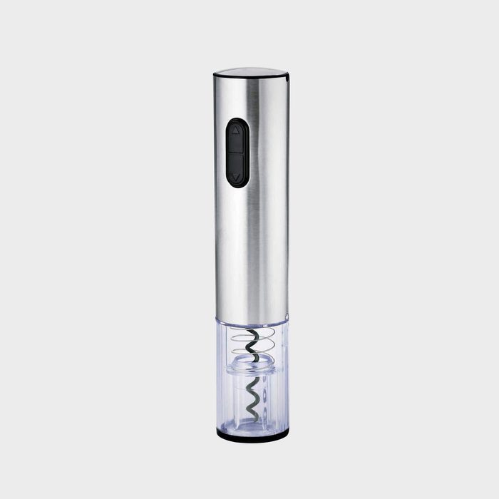A stainless steel electric corkscrew is upright, effortlessly removing corks from wine bottles with a transparent bottom section showing the corkscrew mechanism.