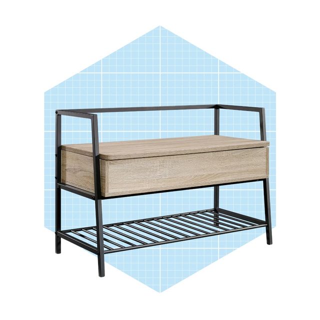 A wooden storage bench with a sliding drawer stands on a metal frame, surrounded by a light blue geometric background.