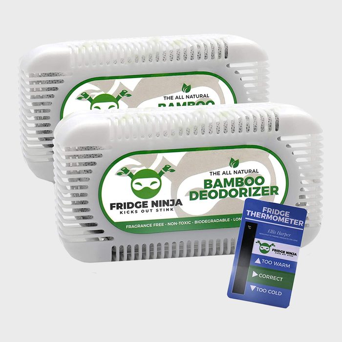 Two bamboo deodorizers are positioned side by side, with a fridge thermometer nearby indicating temperature levels. They are designed to freshen and eliminate odors.
