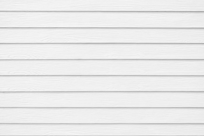 Wall panel paint white color synthetic wooden plank texture surface background. Outdoor panel wood nature pattern or abstract backdrop vintage horizontal lines design and decoration.