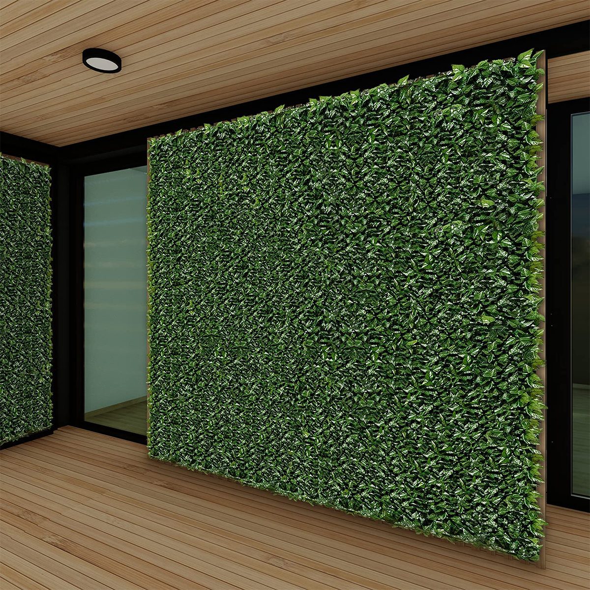 A green leaf wall decoratively covers a modern interior corner, while wooden flooring and a glass door enhance the contemporary setting.
