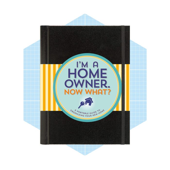 A black notebook with a circular label titled 
