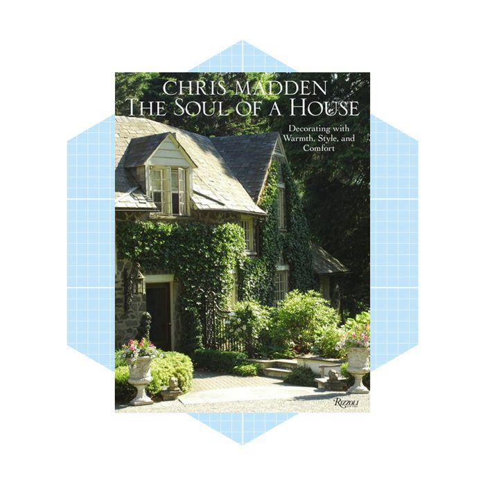 A quaint house covered in greenery, situated in a lush garden, invites warmth and charm, as highlighted in 