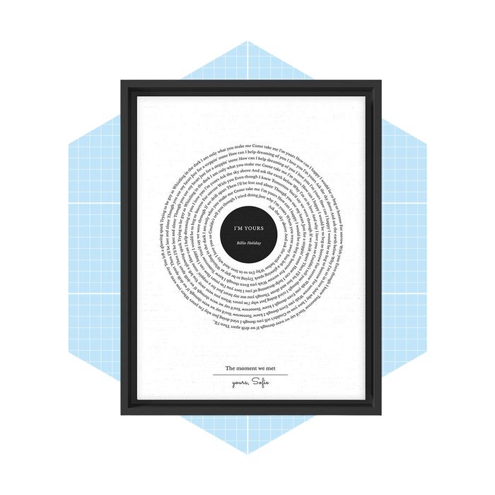 A framed circular text design features the phrase 