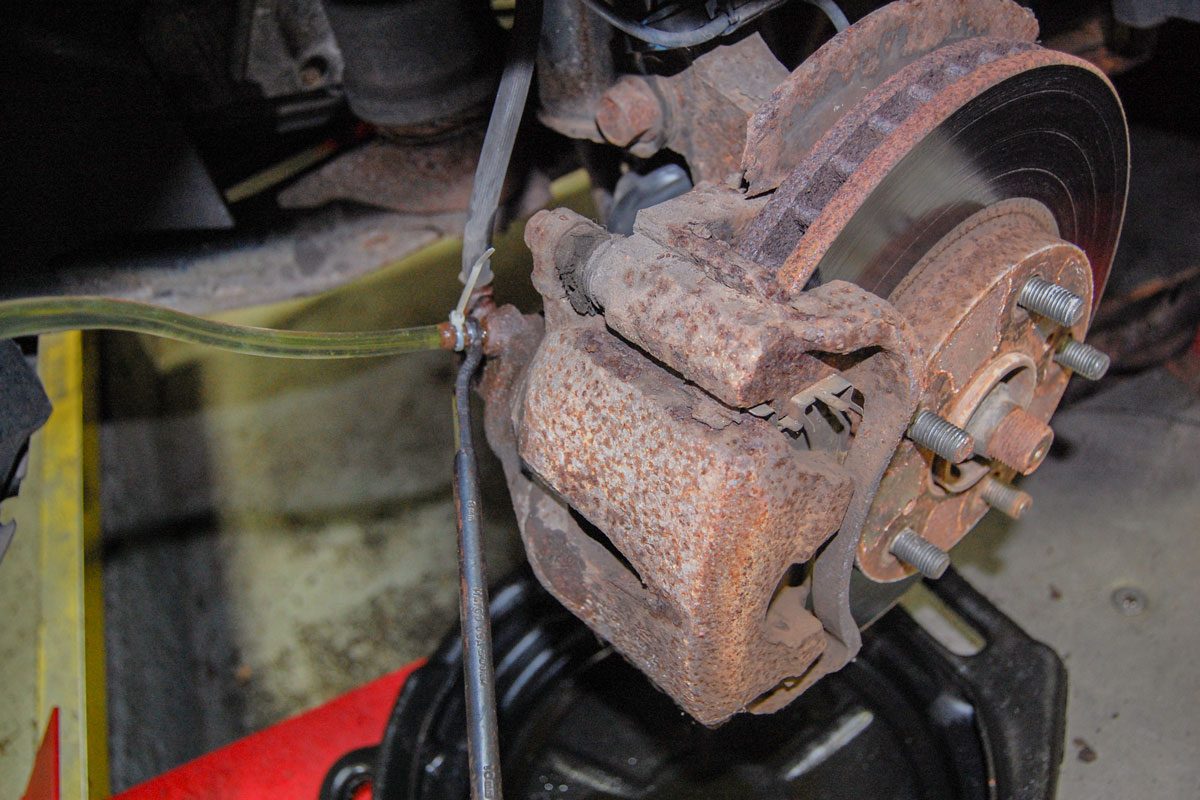 Brake Bleeder Hose On Bleeder Valve Held In Place W Zip Tie